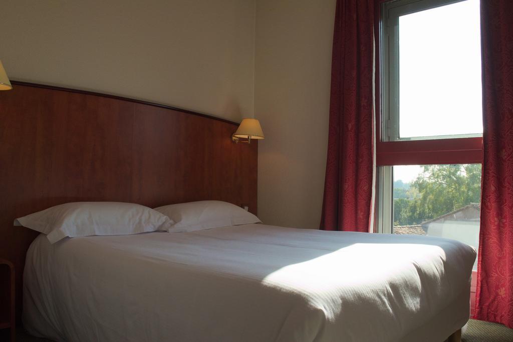 Inter-Hotel Toulouse Aeroport Бланяк Стая снимка